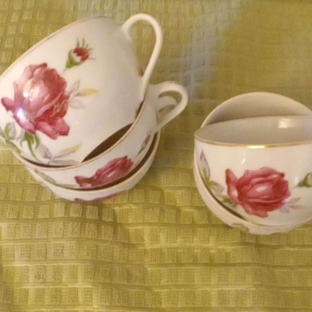 5China teacups and pitcher